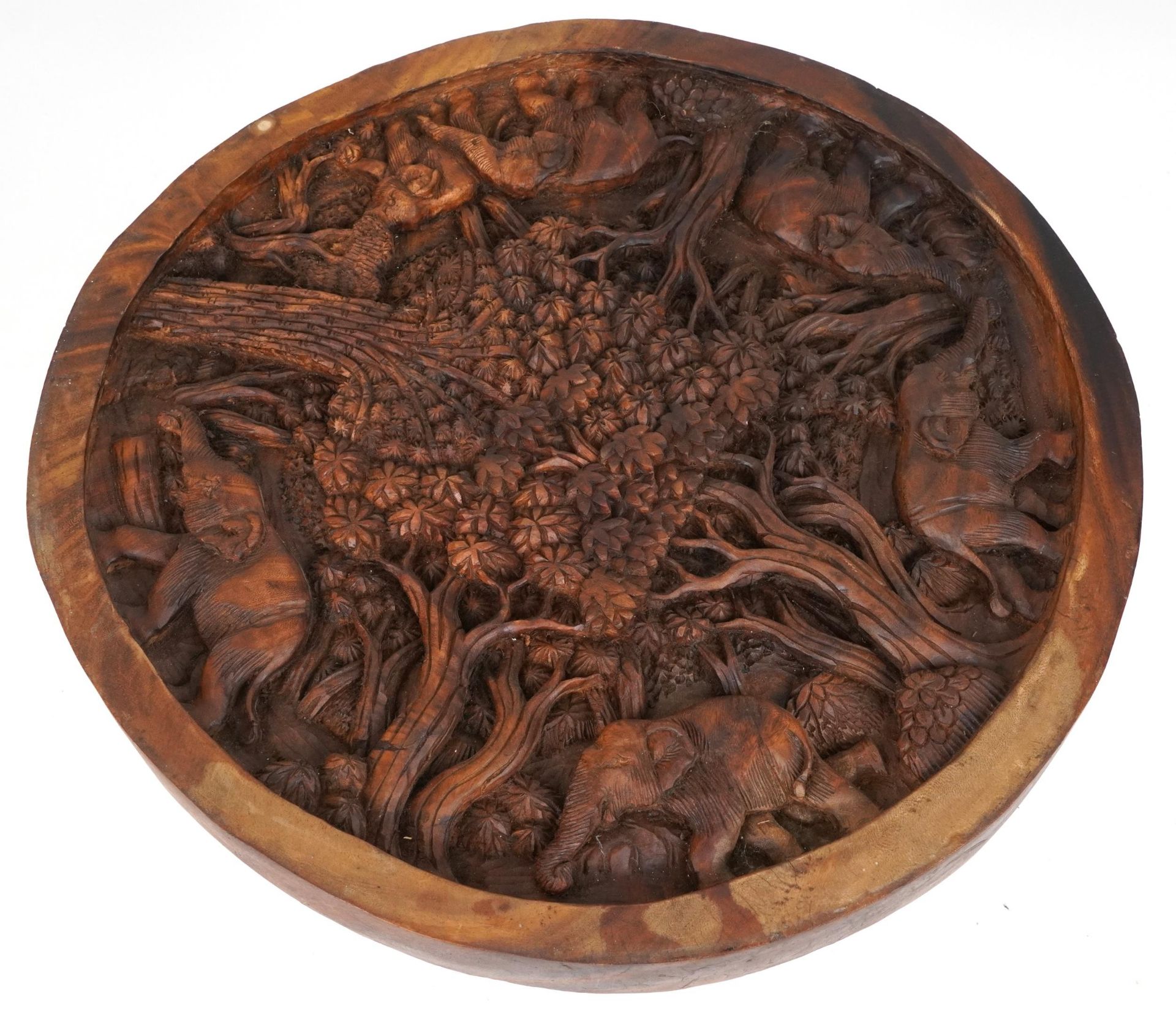 African circular centre table profusely carved with elephants and trees, 80cm high x 75cm in - Image 4 of 4