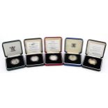 Five United Kingdom silver proof two pound coins with certificates and cases including 50th
