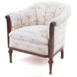 Mahogany framed tub chair with striped upholstery having images of show jumpers, 79cm high : For