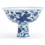 Chinese blue and white porcelain stem bowl hand painted with phoenixes amongst flowers, 10.5cm