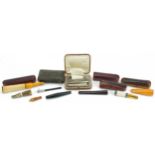 Eight late 19th/early 20th century cigarette holders including butterscotch amber and cherry amber