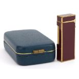 Dunhill gold plated and red enamel pocket lighter with box : For further information on this lot