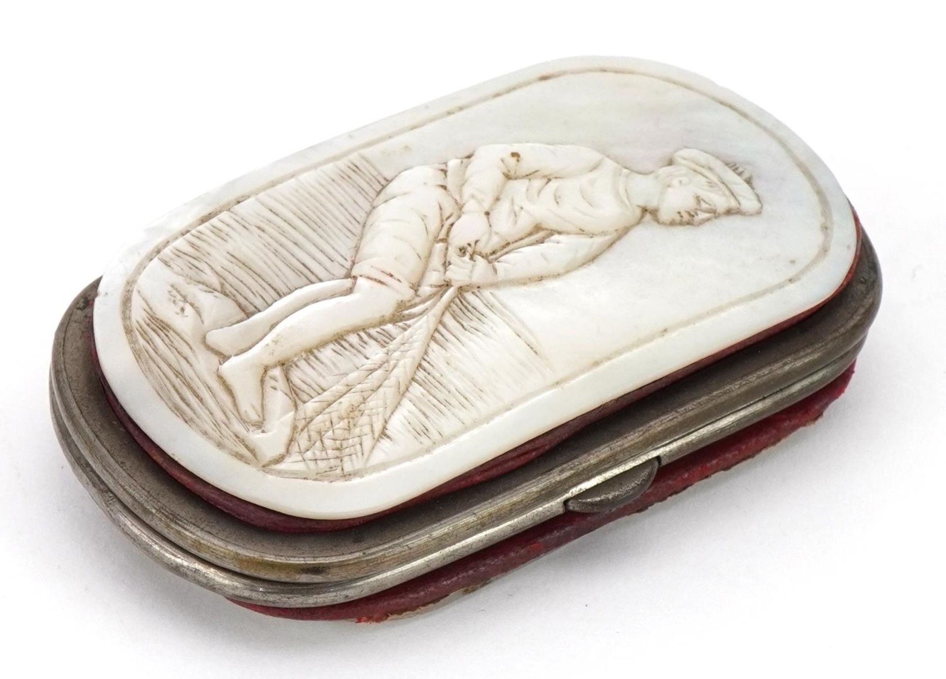 Early 20th century mother of pearl coin purse carved with a fisherman pulling in his catch, 8cm wide
