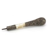 Antique unmarked silver and mother of pearl walking stick handle embossed with shamrocks, 14cm in