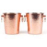 Pair of planished copper ice buckets with ring turned handles, each 21.5cm high : For further