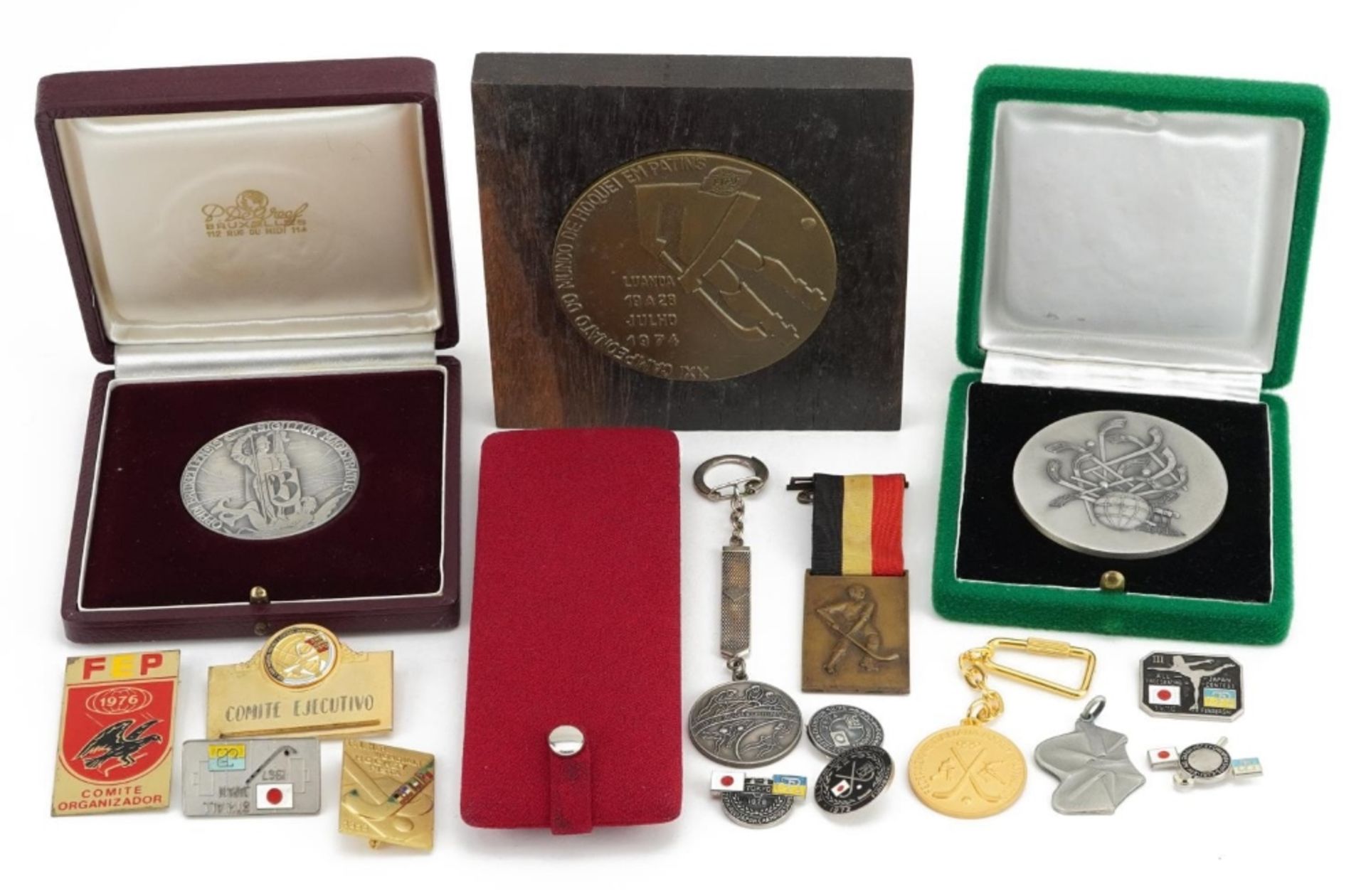 Hockey World Championship memorabilia including 1976 silver medal, silver keyring and World