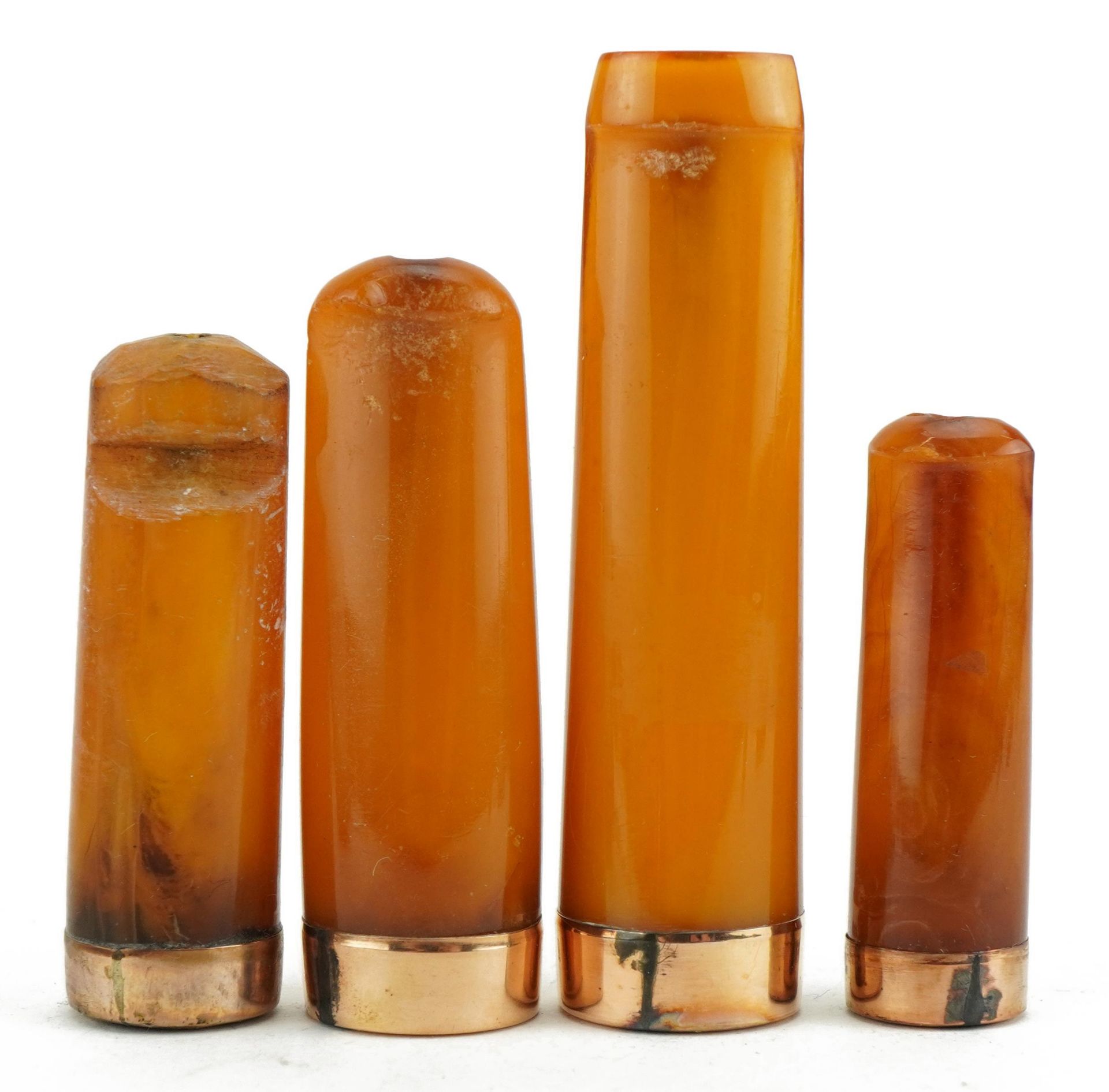 Four late19th/early 20th century butterscotch amber cigarette holders with 9ct gold mounts, each - Image 3 of 4