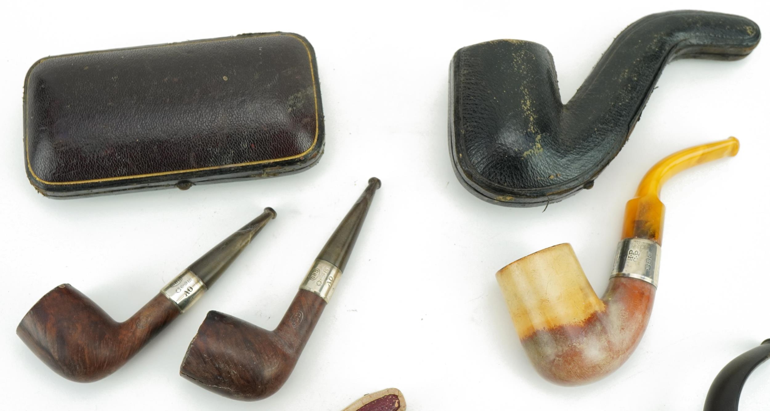 Victorian smoking pipes, four with silver mounts including a pair by G B D housed in a fitted tooled - Image 4 of 5