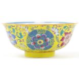 Chinese Tibetan yellow ground porcelain bowl hand painted with Daoist emblems and flowers with