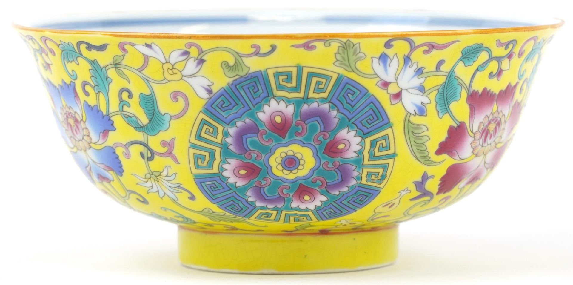 Chinese Tibetan yellow ground porcelain bowl hand painted with Daoist emblems and flowers with