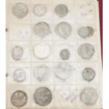 Collection of antique British and world coinage arranged in an album, some silver, including florins