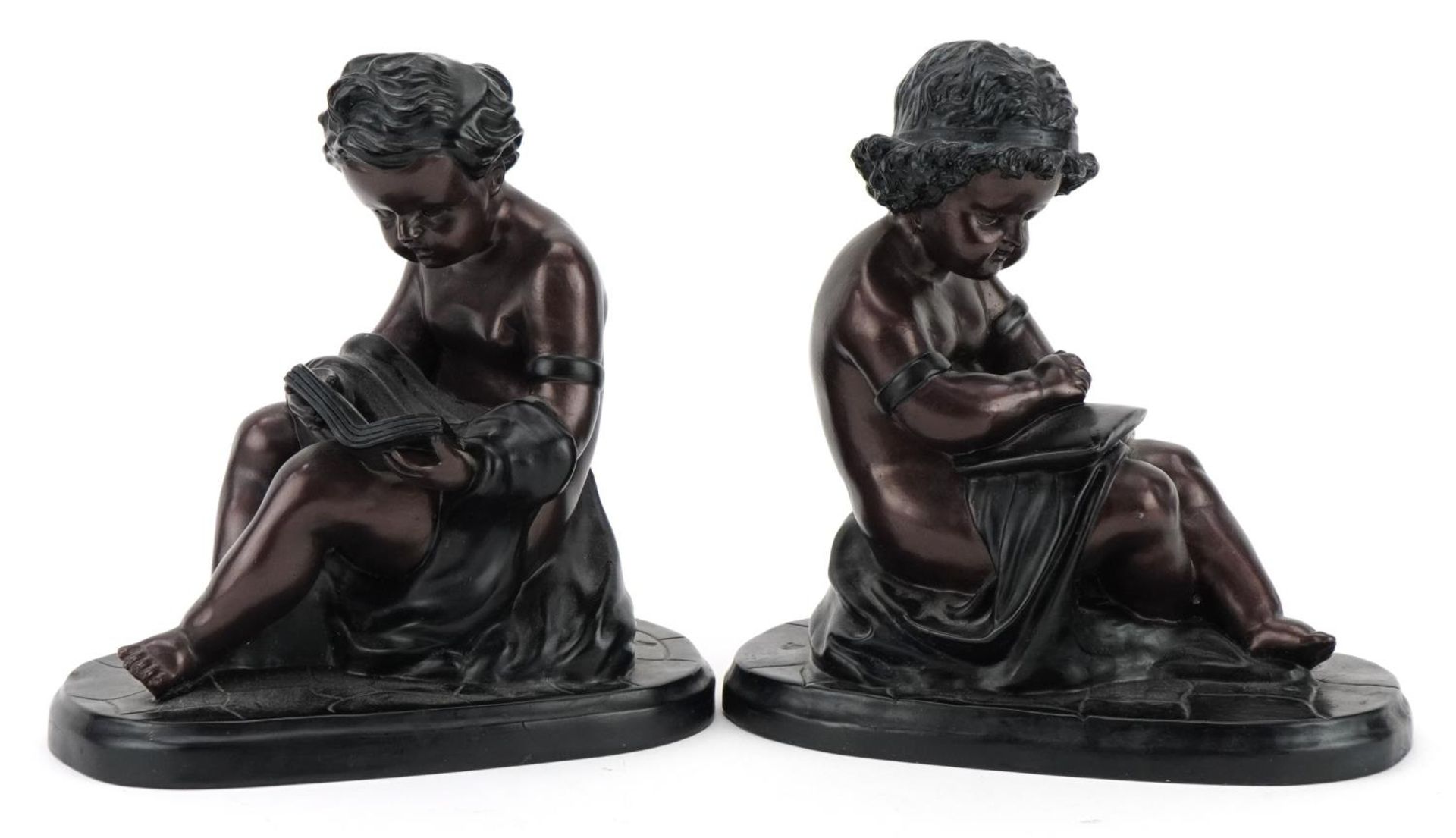 Pair of bronzed figures of nude children, each 18cm high : For further information on this lot