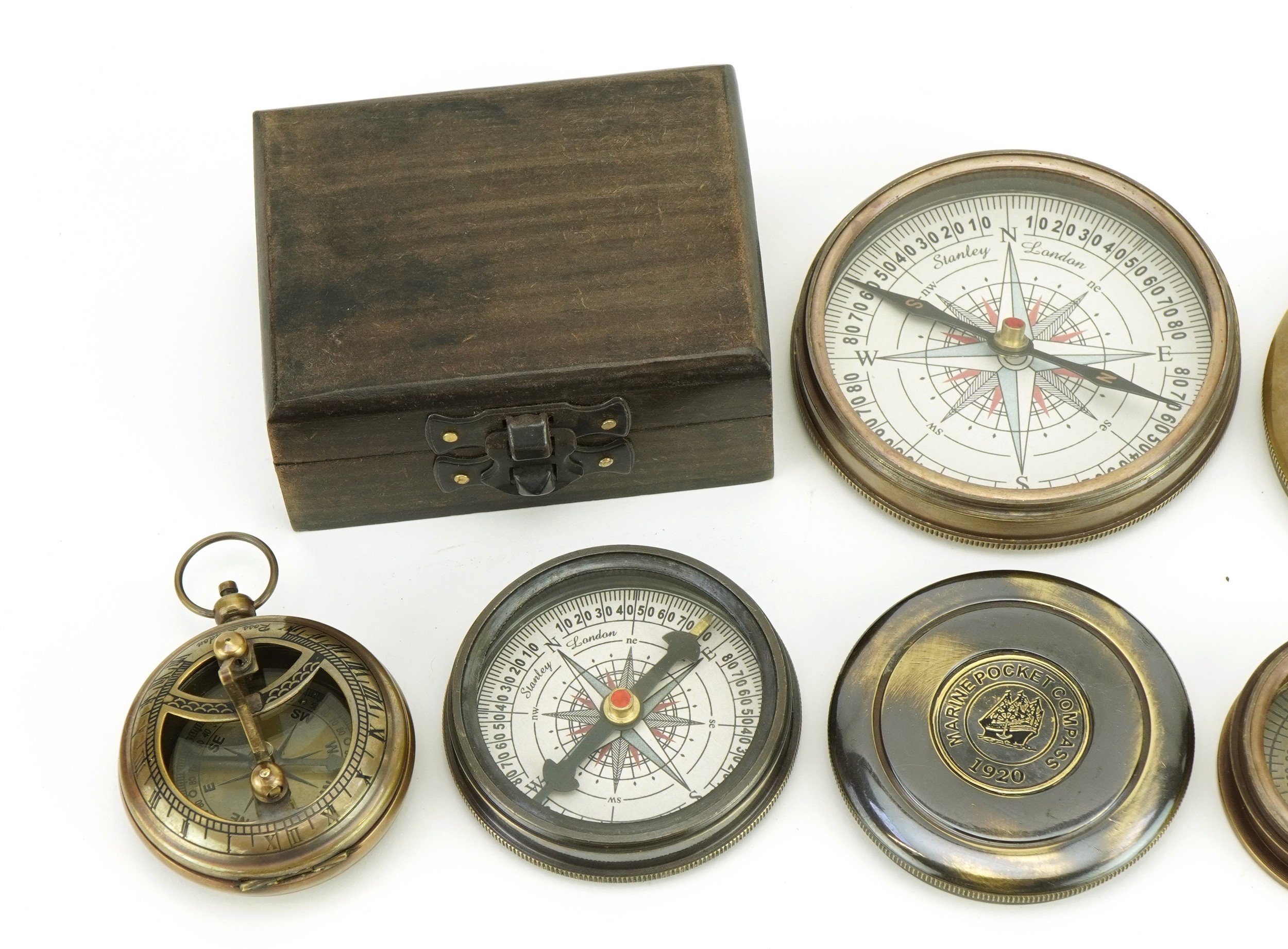 Four compasses including one with case and a maritime interest example, the largest 7.5cm in - Image 2 of 9