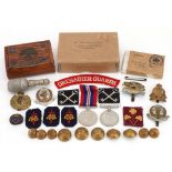 Militaria including World War II medal with box of issue, Grenadier Guards shoulder title, cap