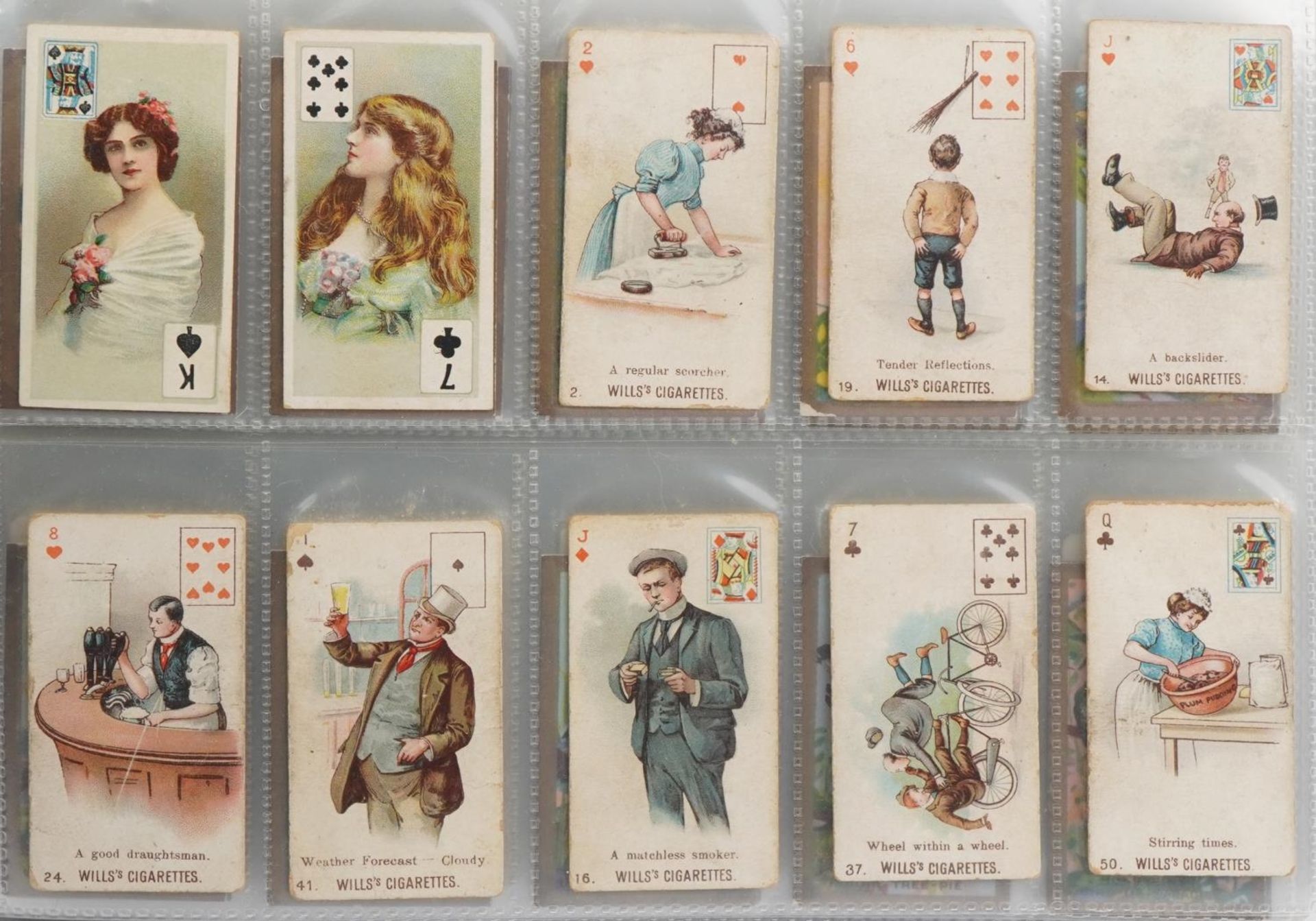 Large collection of cigarette cards arranged in four albums including Wills and Players : For