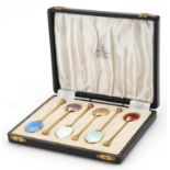 William Suckling Ltd, set of six Elizabeth II silver gilt and guilloche enamel teaspoons housed in a