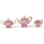 Lenox, American pink glazed porcelain three piece tea set with silver floral overlay comprising