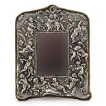Pewter mounted easel mirror decorated in relief with a maiden, Putti and flowers, 27cm x 22cm :