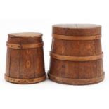 Two antique wooden bound barrel design boxes with covers, the largest 26cm high x 29cm in diameter :