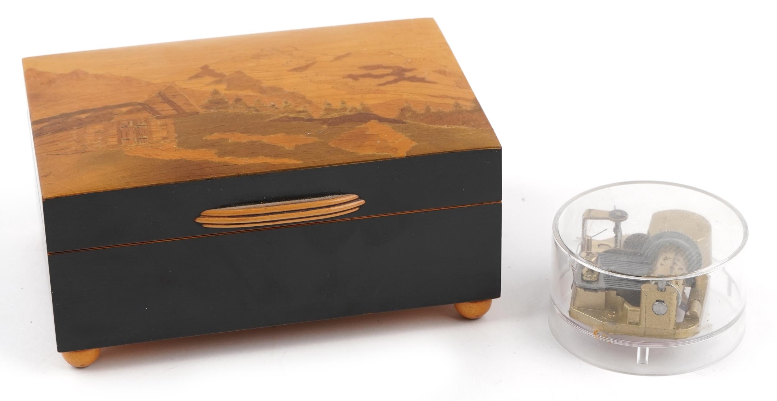 Continental wooden musical box inlaid with the Swiss Alps and a Geneva Swiss musical movement, the