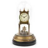Gustav Becker, German brass anniversary clock housed under a glass dome, the clock having a circular