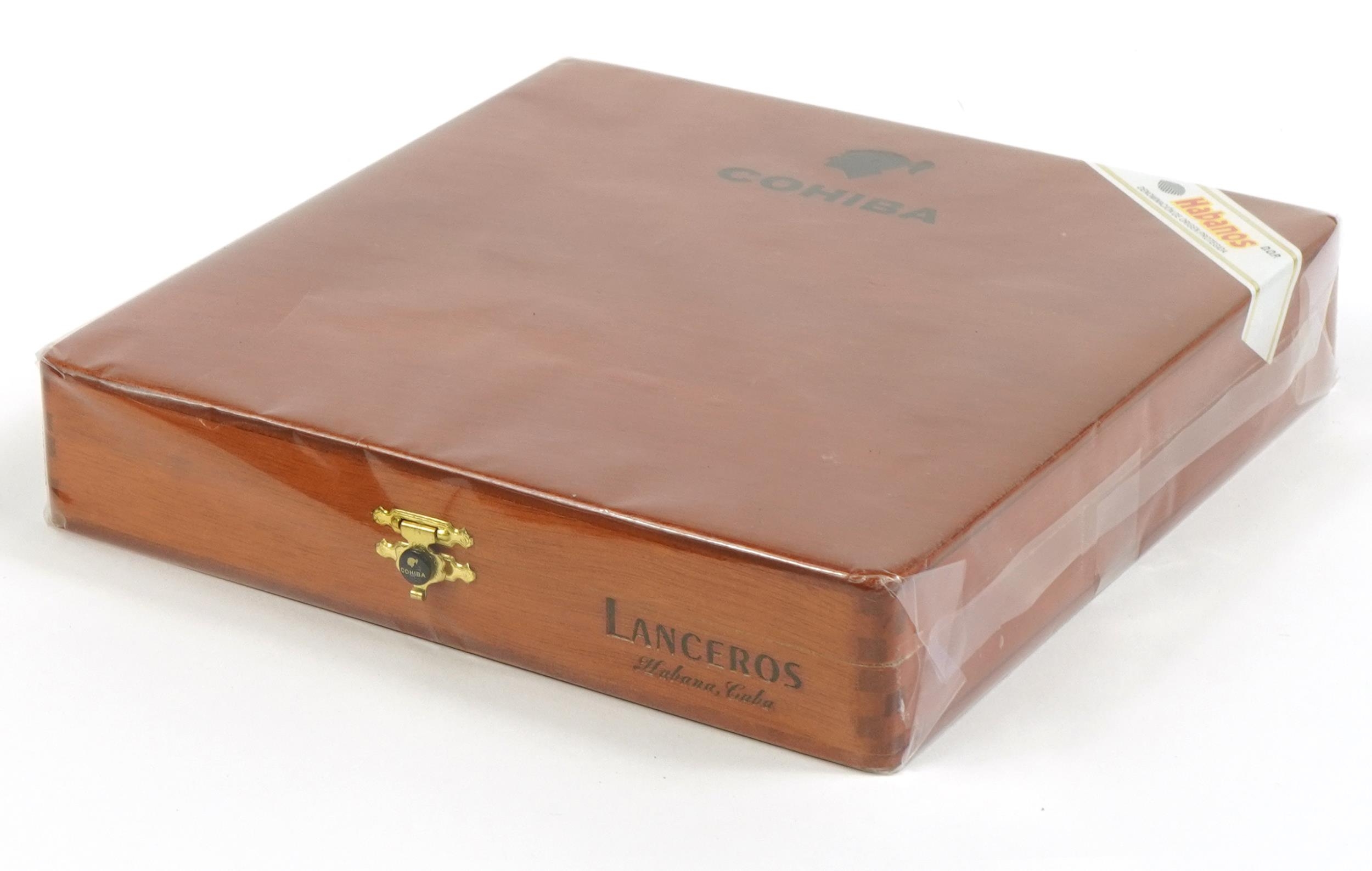 Sealed box of twenty five Cohiba Habanos Lanceros cigars PROVENANCE: Given to the vendor's friend by