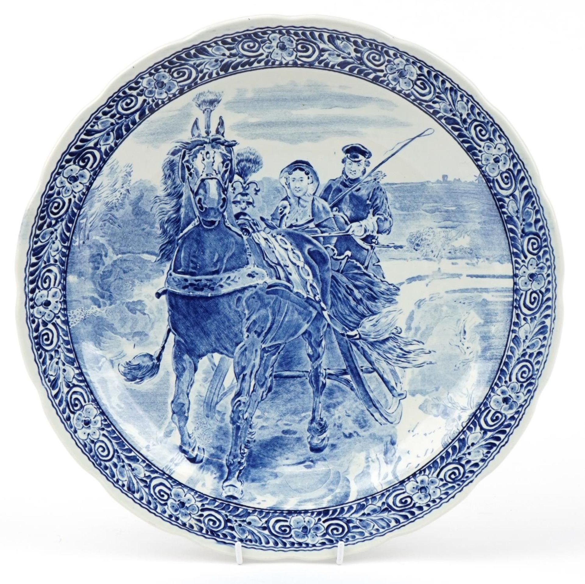 Boch, large Dutch Delft blue and white charger decorated with figures in a horse drawn cart, 39.
