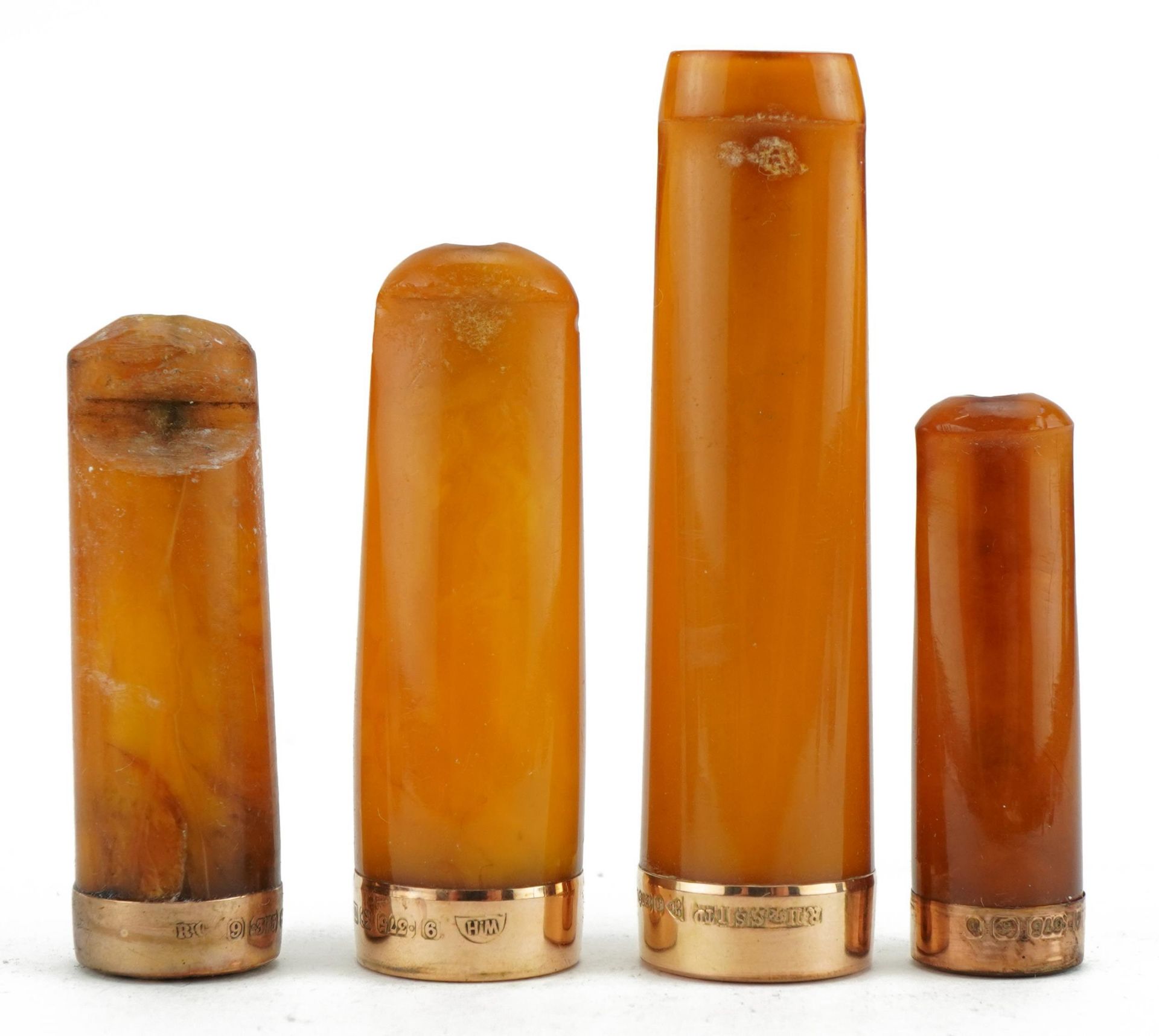 Four late19th/early 20th century butterscotch amber cigarette holders with 9ct gold mounts, each - Image 2 of 4