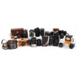 Vintage and later cameras, lenses and accessories including Detrola, Pathe, Zenit-B, Canon AE1,