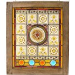 Arts & Crafts Pre Raphaelite leaded stained glass panel hand painted with stylised flowers housed in