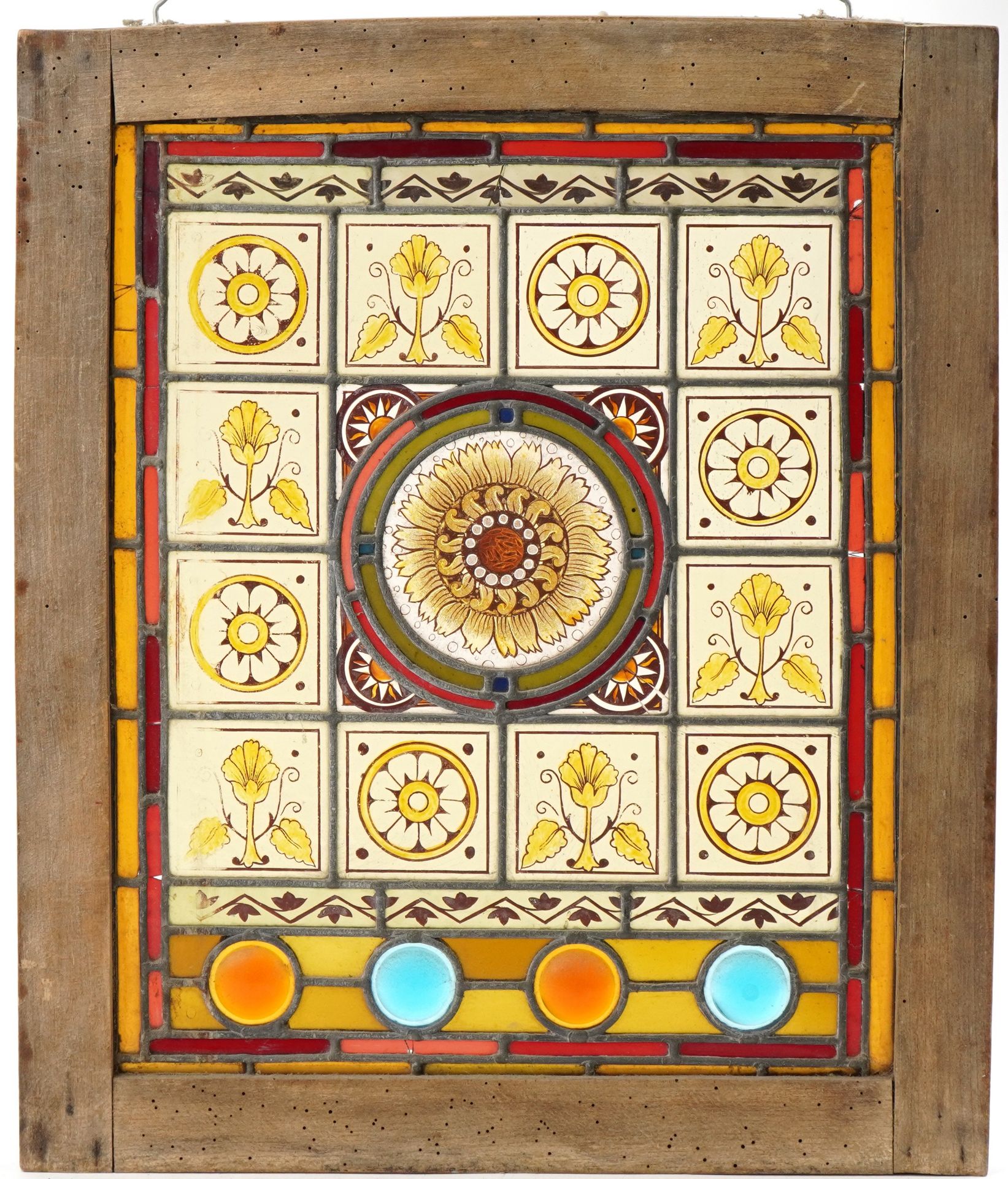 Arts & Crafts Pre Raphaelite leaded stained glass panel hand painted with stylised flowers housed in