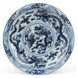 Chinese blue and white porcelain charger hand painted with dragons amongst clouds, character marks