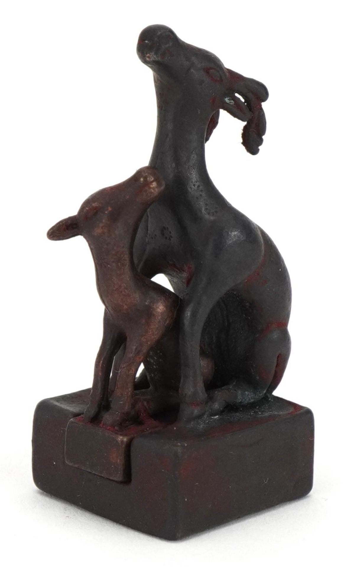 Chinese patinated bronze two piece seal in the form of a deer and a foal, 5cm high : For further