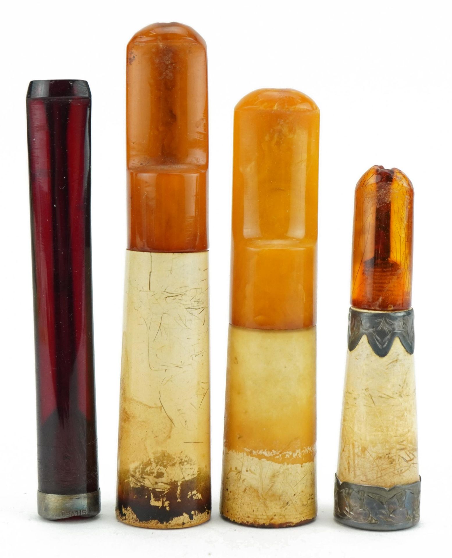 Four late 19th/early 20th century cigarette holders including butterscotch amber and cherry amber - Image 3 of 4