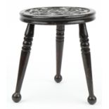 Carved oak Celtic design three legged stool, 31cm high : For further information on this lot