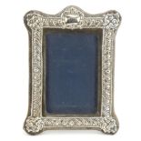 Elizabeth II silver easel photo frame with embossed decoration, London 2014, 20cm x 14.5cm : For