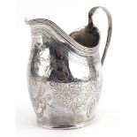 George III silver cream jug engraved with swags and foliage, indistinct maker's mark London 1799,