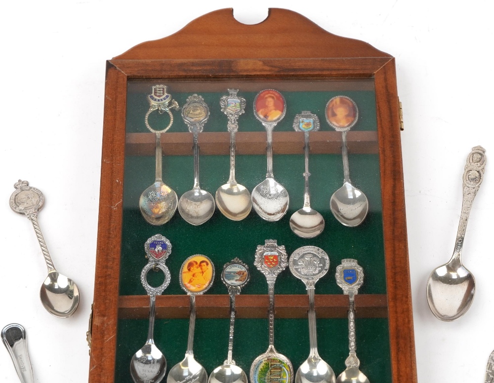 Collection of souvenir and commemorative spoons housed in a display case including two silver - Image 2 of 6