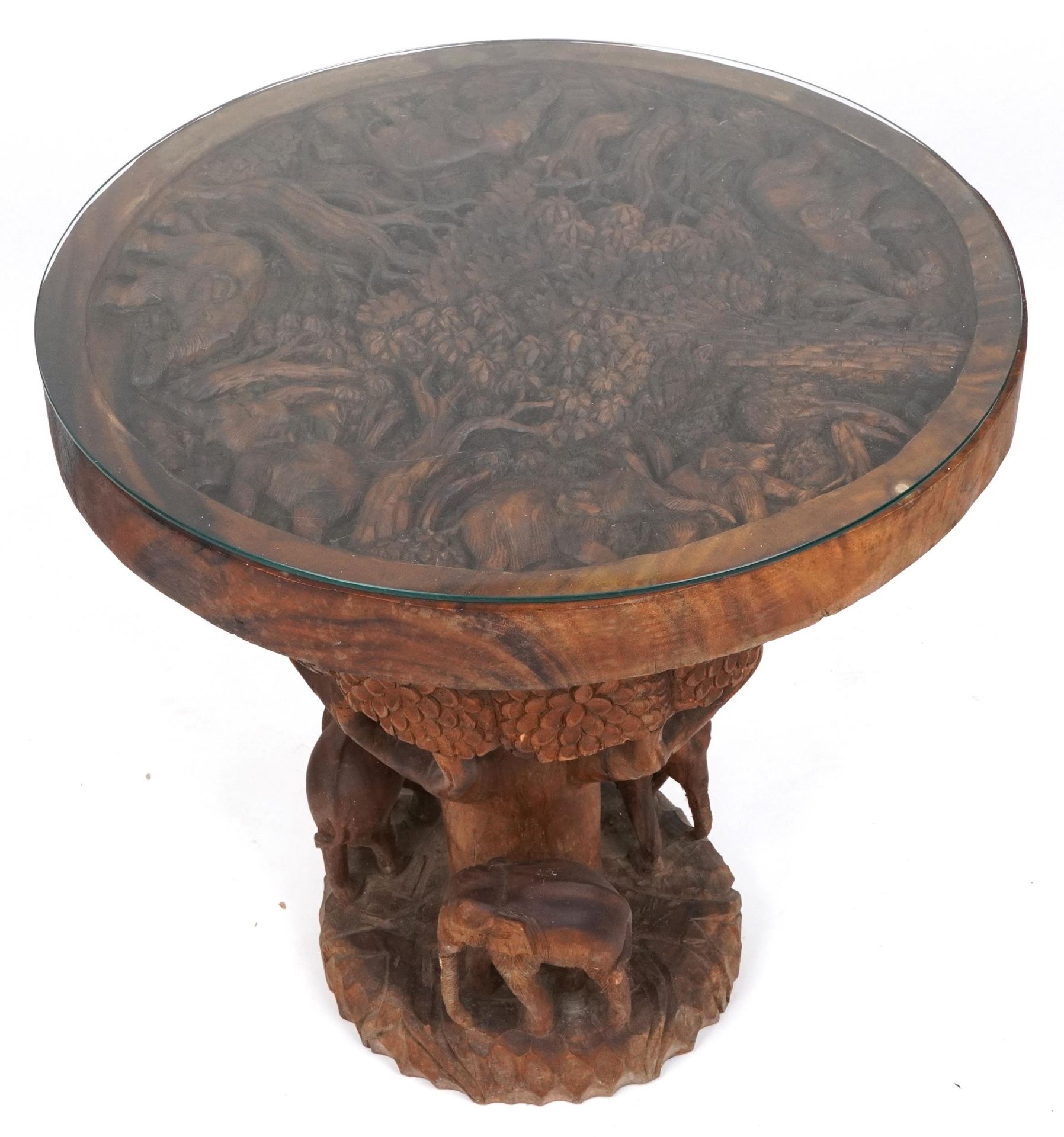 African circular centre table profusely carved with elephants and trees, 80cm high x 75cm in - Image 2 of 4