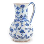 Turkish Ottoman Kutahya pottery water jug hand painted with stylised flowers, 23cm high : For