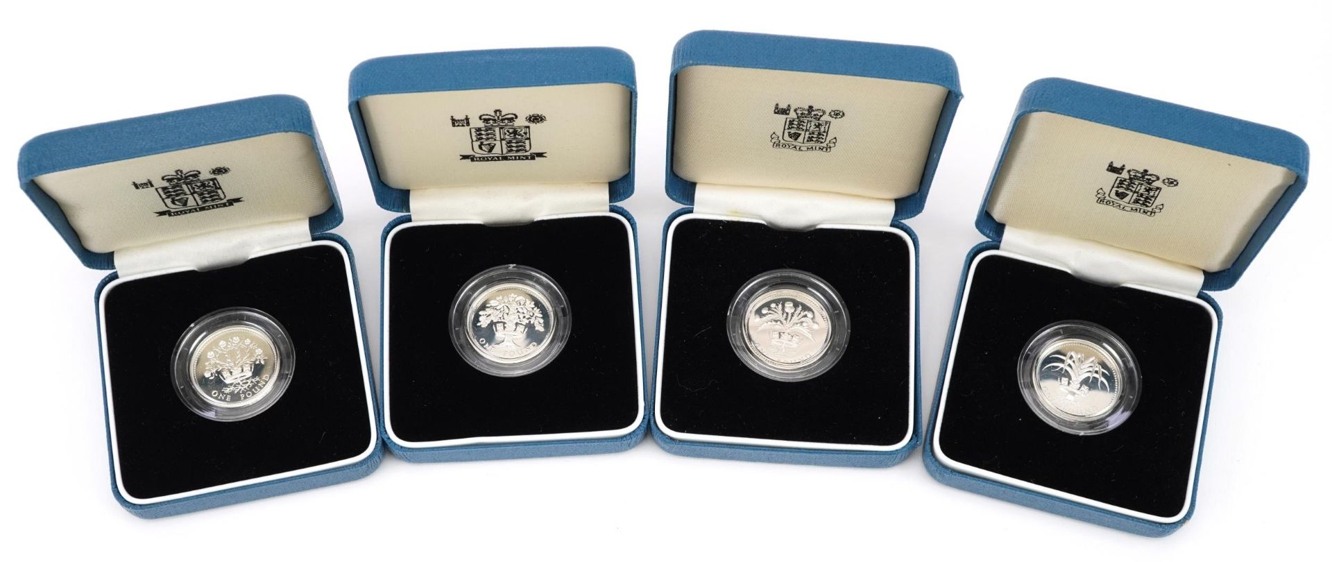Four United Kingdom silver proof one pound coins by The Royal Mint with certificates and cases - Image 2 of 3
