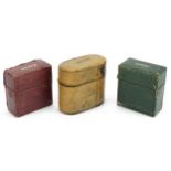 Three early 20th century leather cased metal vestas with leather overlay impressed Vesta and