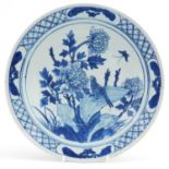Chinese blue and white porcelain shallow dish hand painted with butterflies amongst flowers, 30cm in