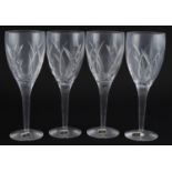 Set of four Waterford Crystal Champagne glasses designed by John Rocha, each 23cm high : For further