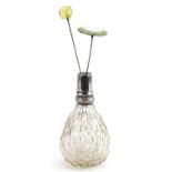 Cut glass scent bottle with silver mount and two hatpins including one with green and white
