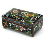 Japanese cloisonne casket enamelled with butterflies amongst flowers, 7.5cm H x 15.5cm D x 9cm D :