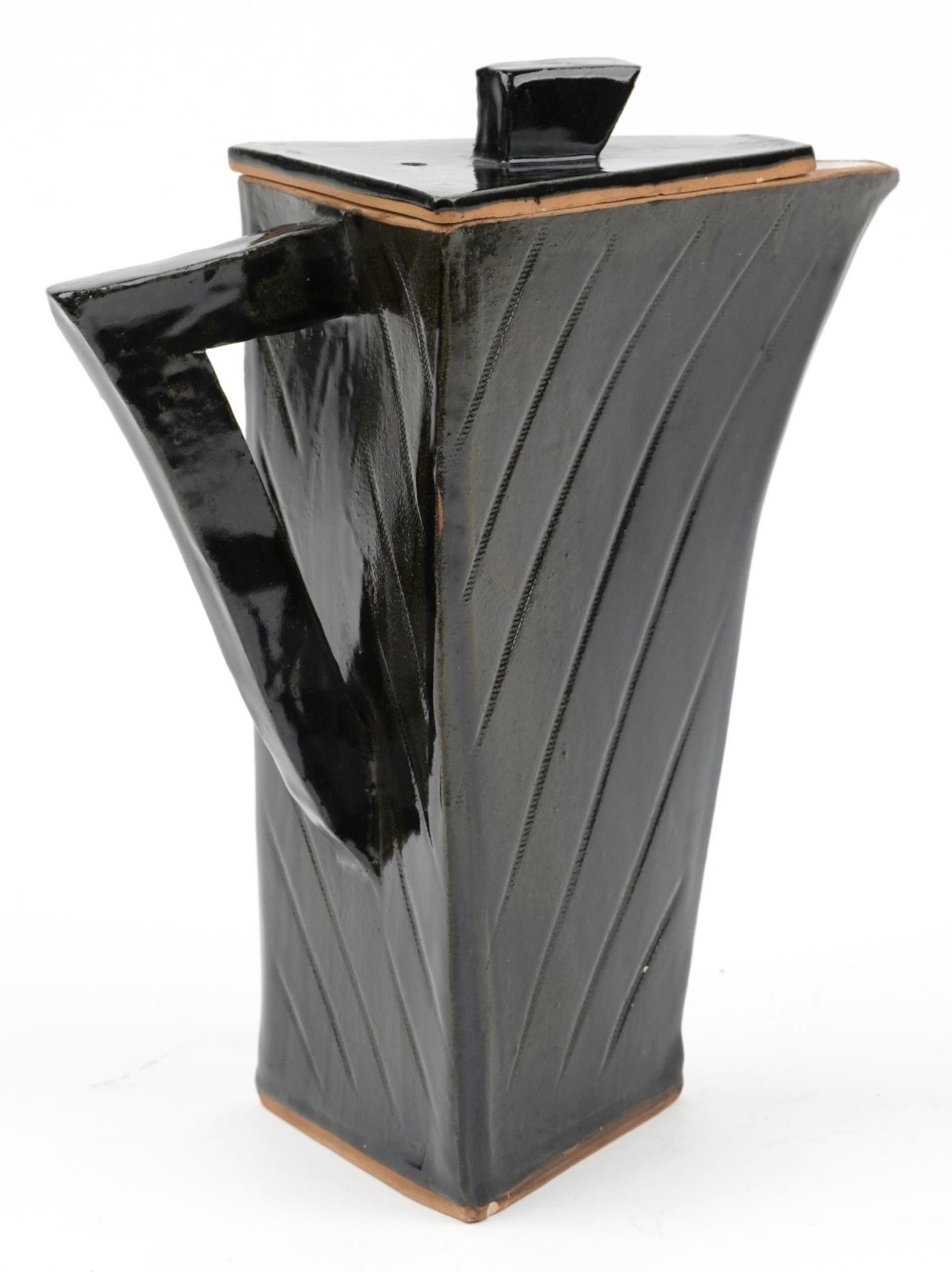 Studio pottery stylised lidded water jug having a black glaze, 26cm high : For further information - Image 2 of 3