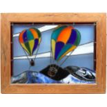 Large pine framed leaded stained glass panel of two hot air balloons, the panel 100cm x 73.5cm,
