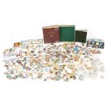 Collection of antique and later British and world stamps, some arranged in three albums : For