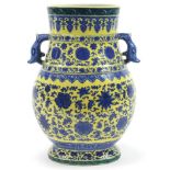 Large Chinese yellow ground porcelain vase with animalia handles hand painted with flower heads